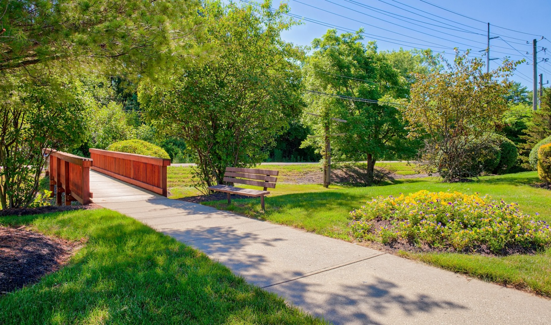 Direct access to The Monon Trail Trail with bench